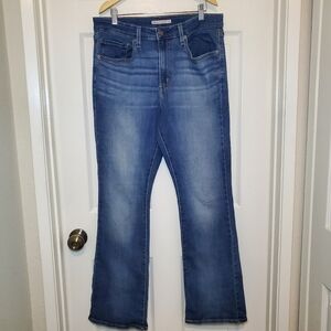 Women's Levi's 725 High Rise Bootcut Stretch Jeans. Size 33 Med Blue